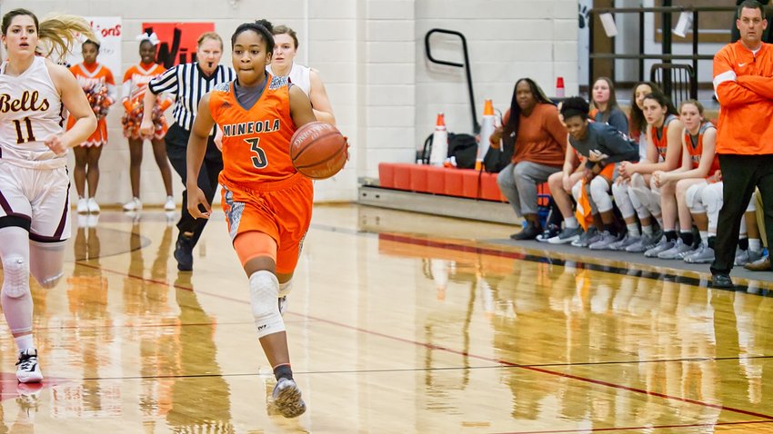 Sabria Dean leads the breakaway on the way to a 49-35 win over Bells.