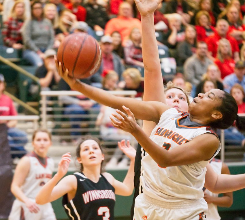 Sabria Dean lays it in agains Winnsboro in the Lady Jackets' final game against Winnsboro.