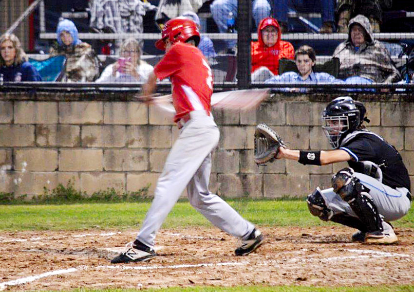 Alba-Golden’s Kason Trimble takes a healthy cut at a pitch in last Friday’s game against Como-Pickton.