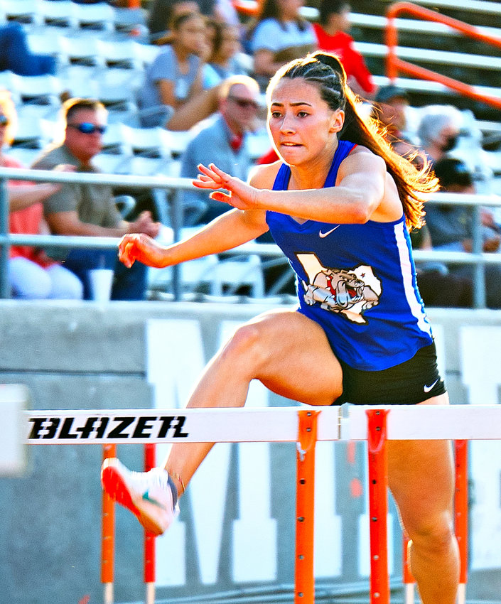 Brooklyn Marcee of Quitman competes in the 100-meter hurdles at the district track meet. She runs the 300-meter hurdles at the state meet in Austin Thursday at 7:20 p.m.