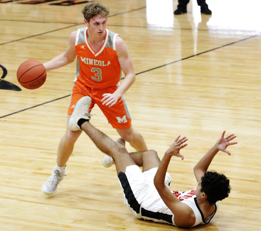 Jonah Fischer in action during basketball season.