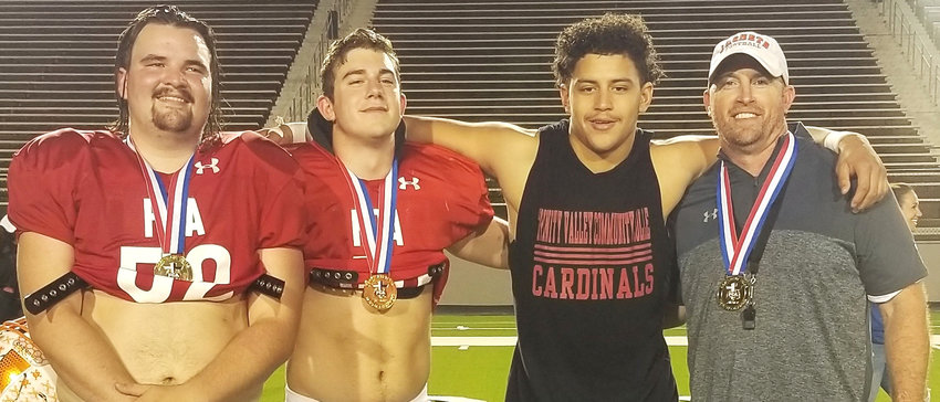 Former Mineola football stand-outs (from left) Dawson Elmore, Hunter Wright and Kobe Kendrick stand with FCA Red team head coach and Mineola athletic director Luke Blackwell after the all-star game win June 5 in Tyler.