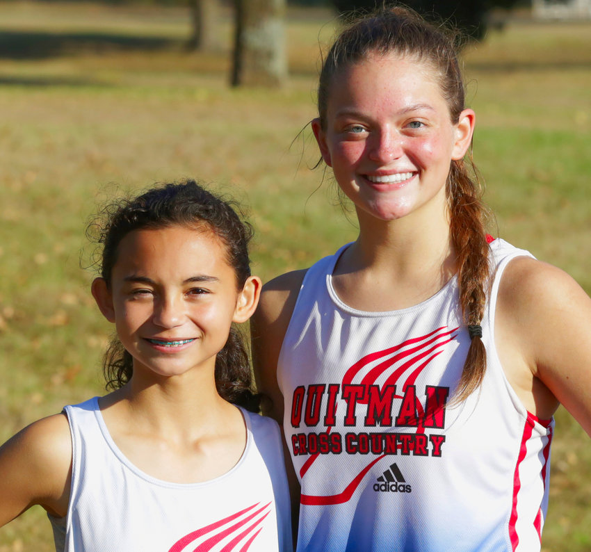 Lady Bulldogs Katie Degorostiza and Madyson Pence, who finished in first and third place respectively, led the Quitman girls to a district cross country championship.