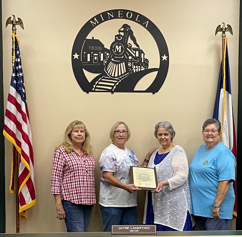 Mayor Jayne Langford proclaimed Oct. 18 as Pilot International Founders Day. Mineola Pilot members Joyce Curry, Joy Stuart and Janell Abbott accepted the proclamation.